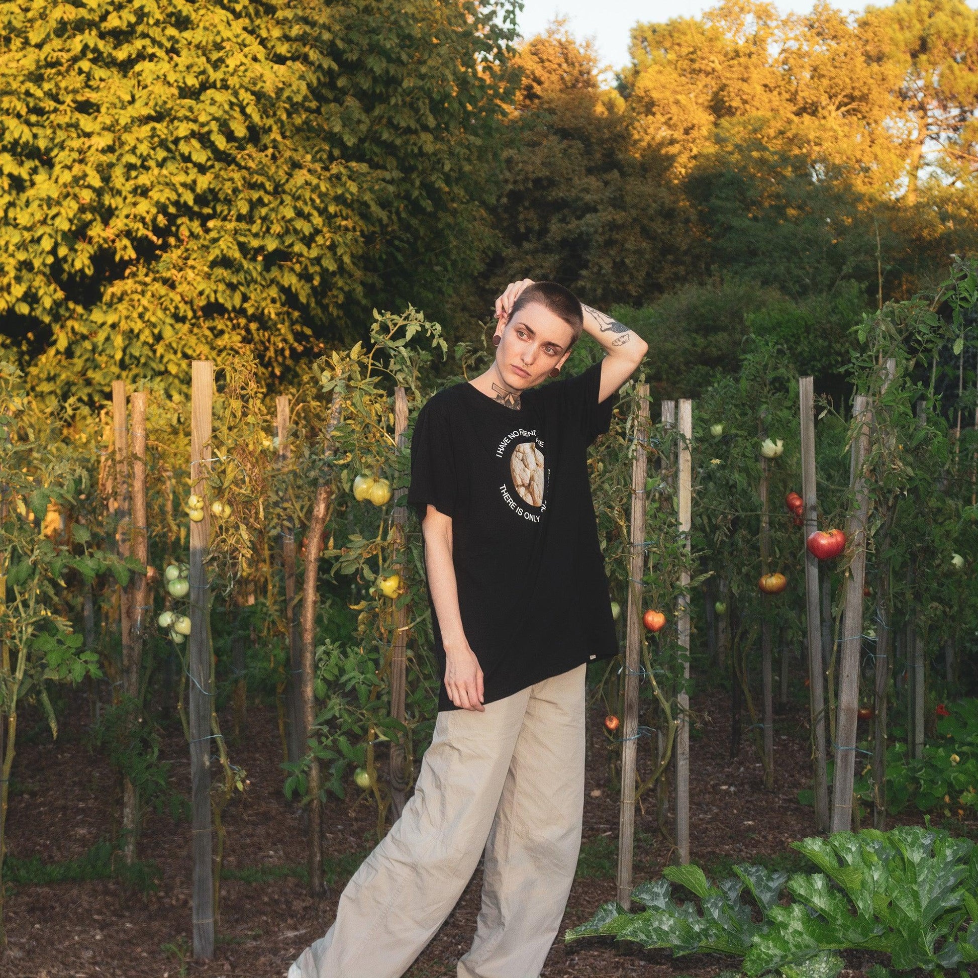 Woman model wearing Cauliflower unisex tshirt from Chaotic Kittens in the nature.