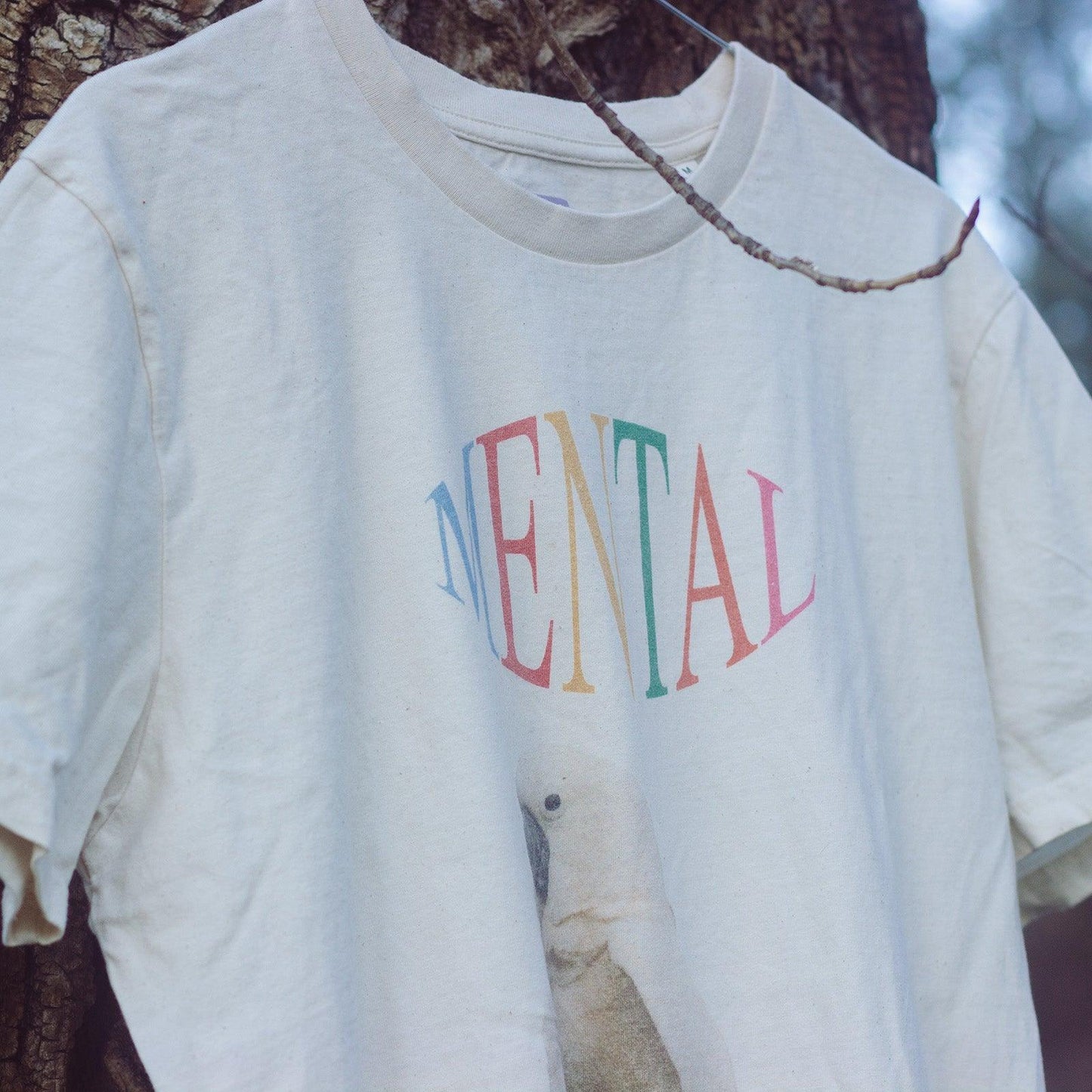 Mental Chaotic Kittens tshirt hanging on a tree