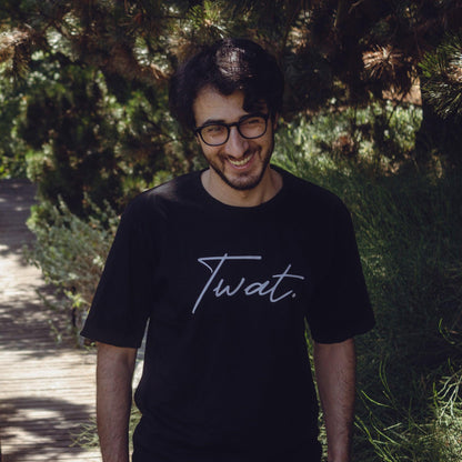 Model wearing twat oversized tshirt in nature.